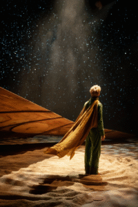 petit prince seul, avion, sable, étoiles